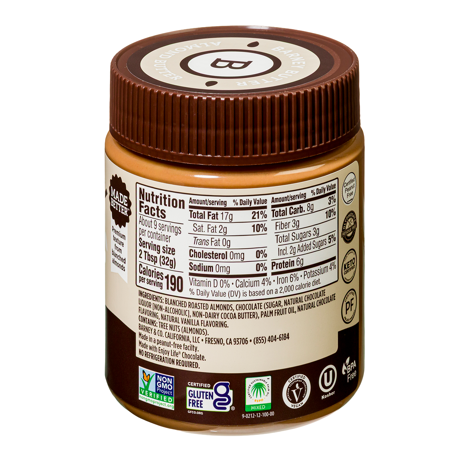 A jar of almond butter with a brown lid displays nutrition facts and ingredient details on its label, highlighting its gluten-free and non-GMO certifications.