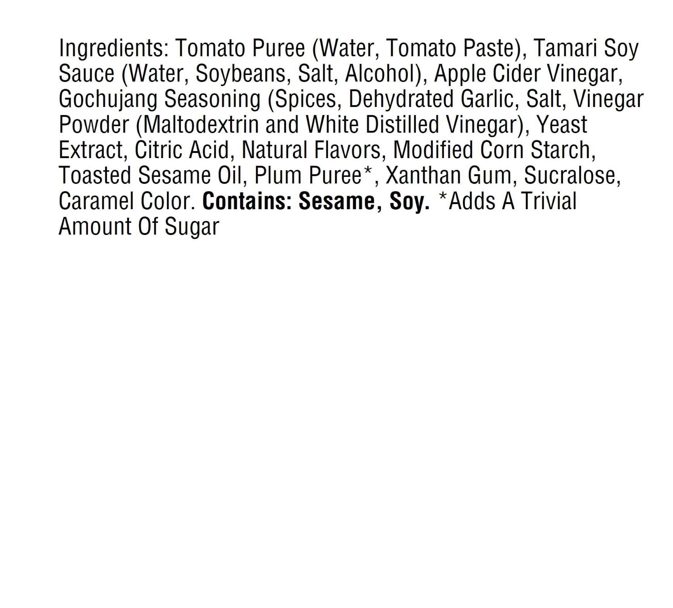 A list of ingredients for a food product, including tomato puree, tamari soy sauce, gochujang seasoning, and various other components, highlighting the presence of sesame and soy.