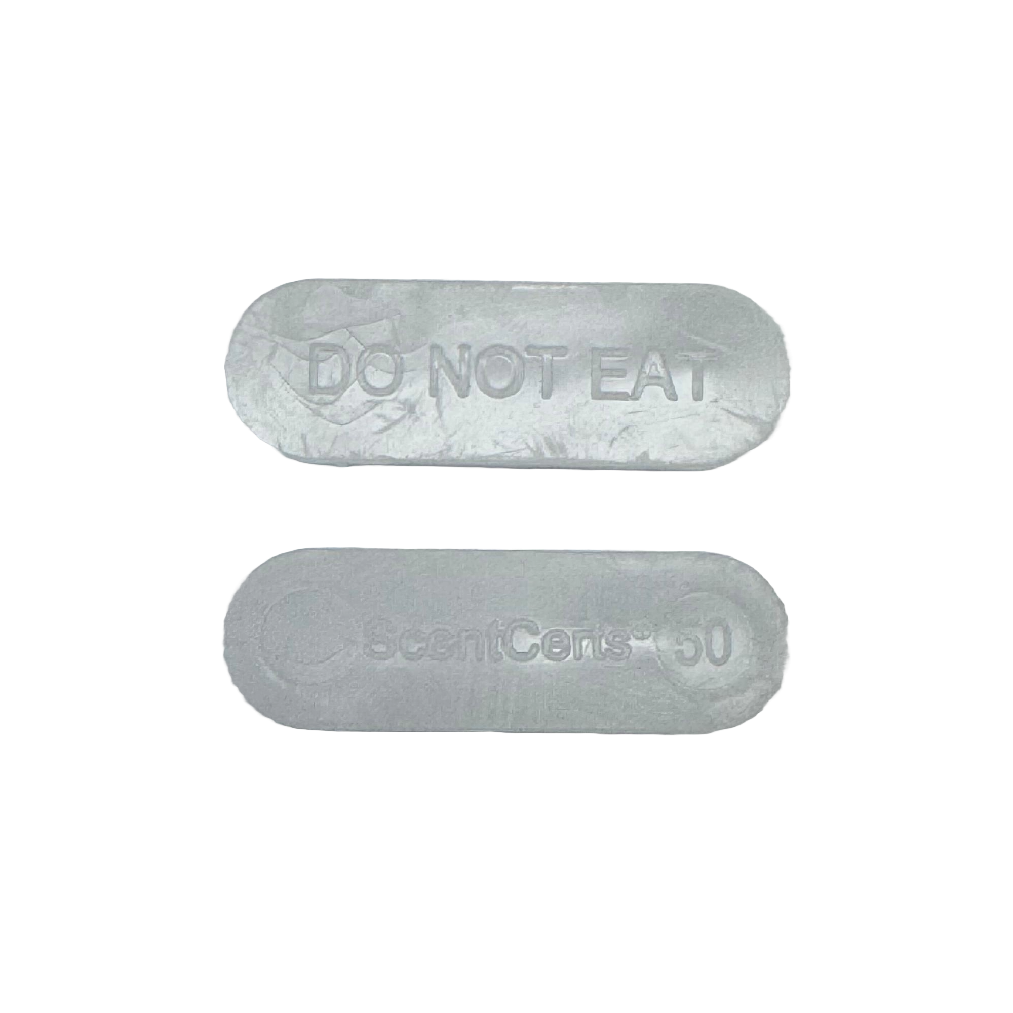 Two gray, oval-shaped packets are displayed, one labeled "DO NOT EAT" and the other "ScentCents® 50," indicating they are not for consumption and likely used for scent purposes in packaging.