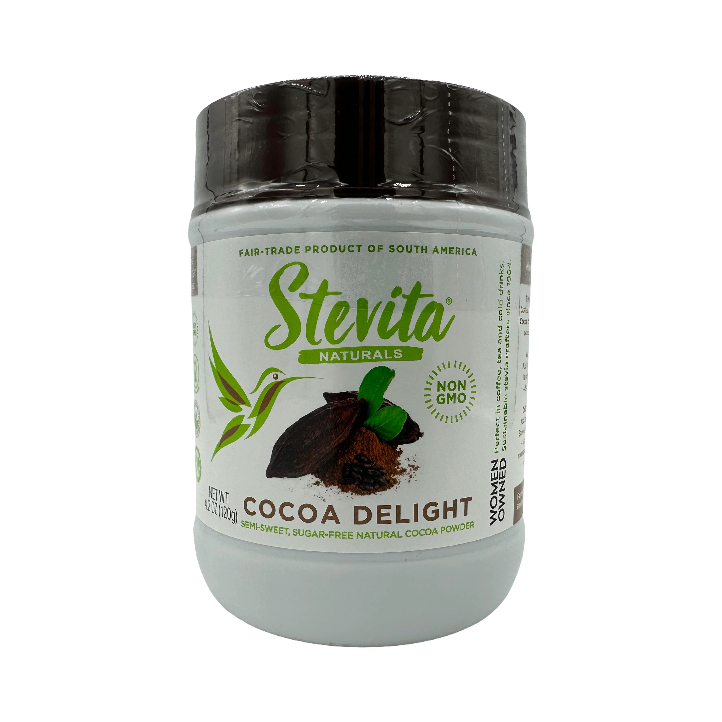 A white container of Stevita Naturals Cocoa Delight cocoa powder features a green logo, a hummingbird graphic, and labels indicating it is non-GMO and a fair-trade product from South America.