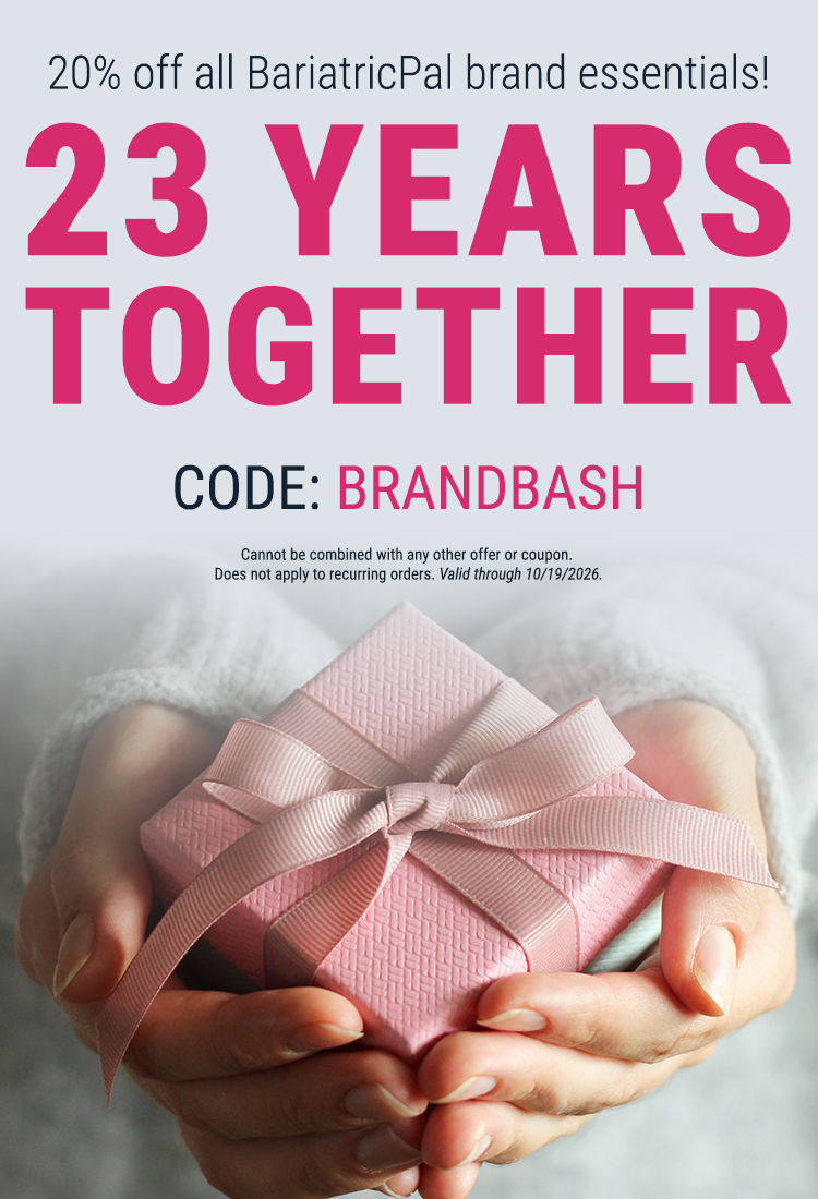 A person holds a pink gift box with a ribbon, promoting a 20% discount on BariatricPal brand essentials, celebrating 23 years together, with a code for the offer displayed.