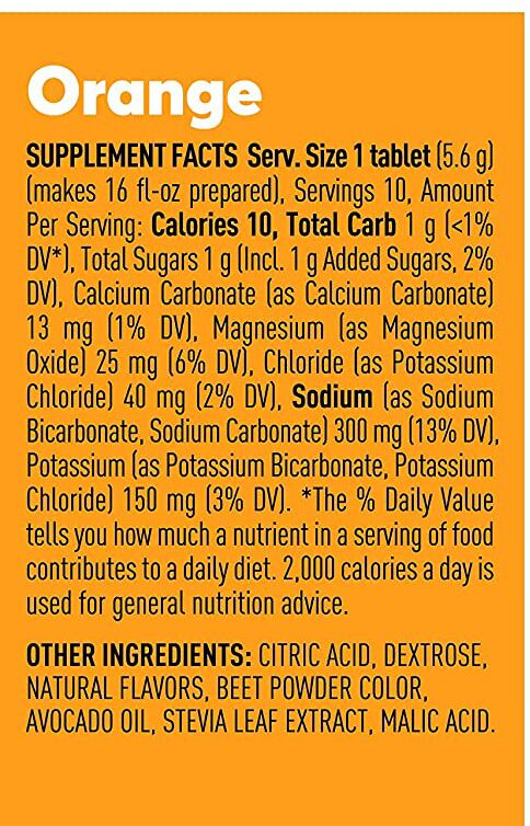 Orange supplement facts label detailing nutritional information for one tablet, including servings, calories, carbohydrates, and various minerals like sodium and potassium, on a bright orange background.