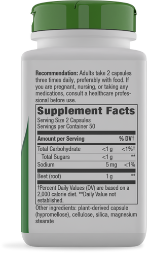 A white supplement bottle with a green cap displays the label detailing serving size, nutritional information, and recommendations for use, emphasizing beet root as the main ingredient.