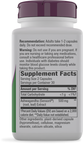 A white bottle of dietary supplement with a purple cap displays a label detailing usage recommendations, warnings, and supplement facts, including Ashwagandha extract and serving size information.