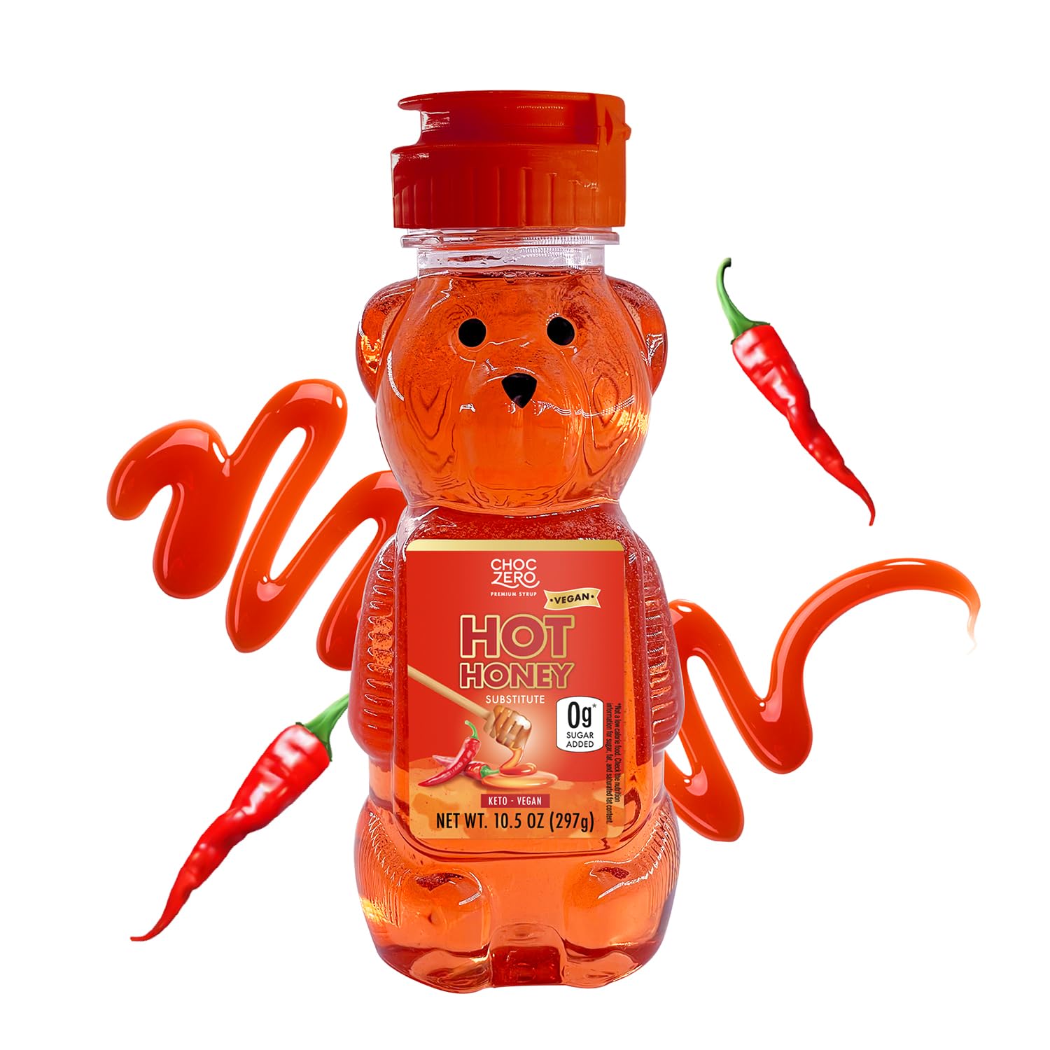 A bear-shaped bottle of ChocZero hot honey, with a bright orange color, features a label highlighting it as a vegan substitute, surrounded by red chili peppers and a swirl of honey.