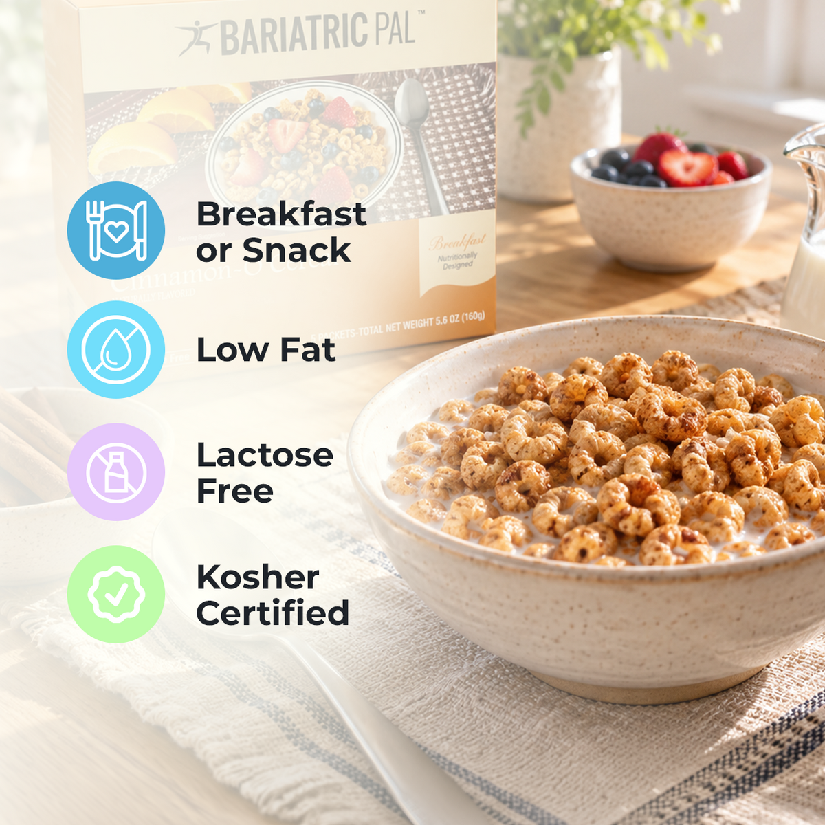 A bowl of cinnamon-flavored cereal sits on a table with a spoon, next to a box labeled "Bariatric Pal," highlighting features like low fat, lactose-free, and kosher certified for breakfast or snack.