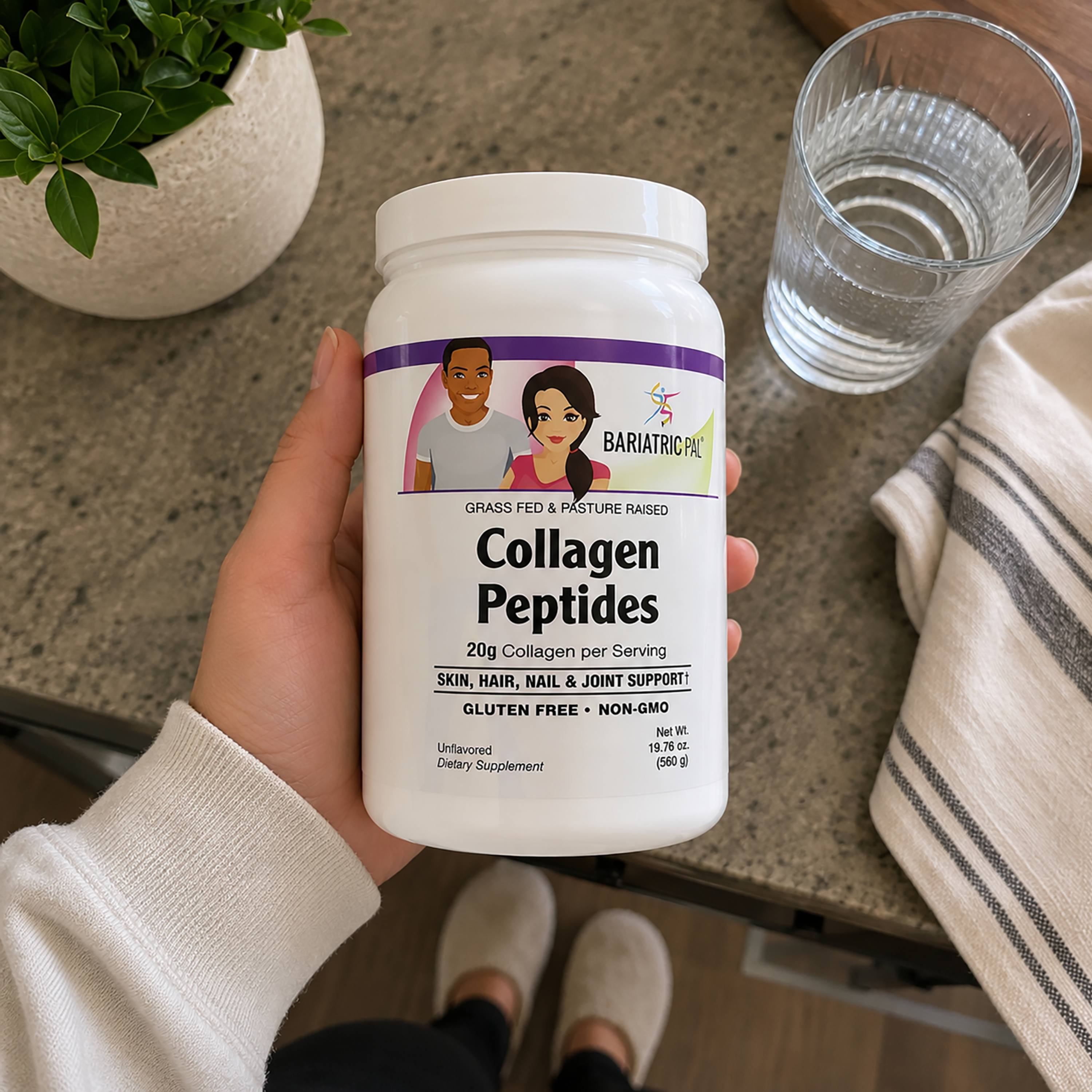 Woman holding bottle of BariatricPal Collagen Peptides – Unflavored, 20 g Collagen per Serving