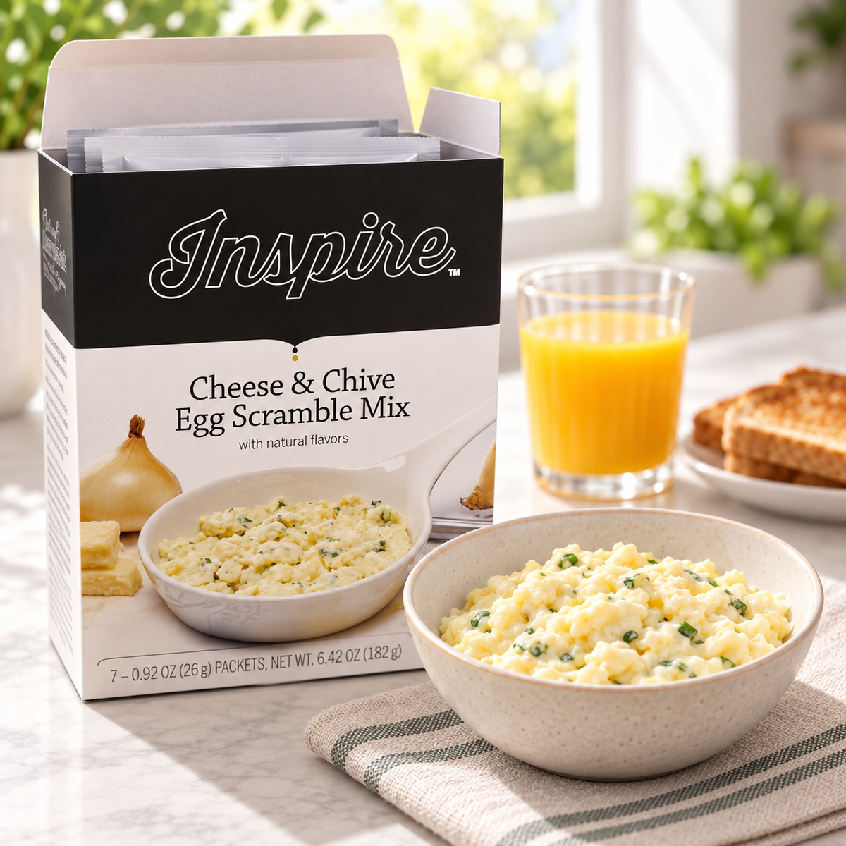 Inspire Cheese & Chive Egg Scramble Mix. Each packet has 90 calories, 14 grams of protein, 6 grams of carbs and 3 grams of fiber.