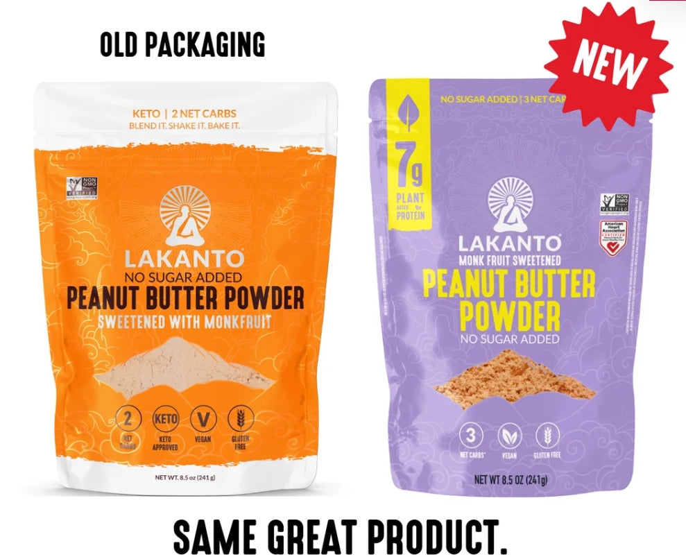 Two packages of Lakanto Peanut Butter Powder are displayed side by side, with the old packaging in orange labeled "OLD PACKAGING" and the new purple packaging marked "NEW," highlighting updated features.