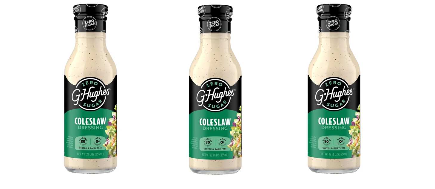 Three bottles of G. Hughes coleslaw dressing are displayed, featuring a creamy beige color, a black cap, and a label indicating it's zero sugar, gluten-free, and dairy-free.