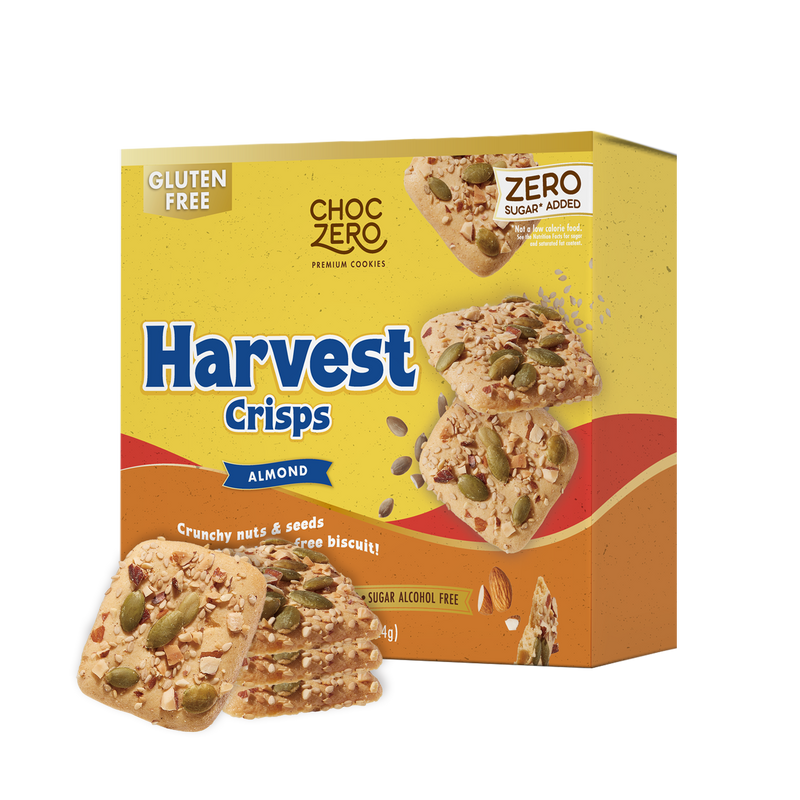 Crunchy almond and seed biscuits are displayed in front of a colorful packaging labeled "Harvest Crisps" by ChocZero, highlighting that they are gluten-free and contain no added sugar.