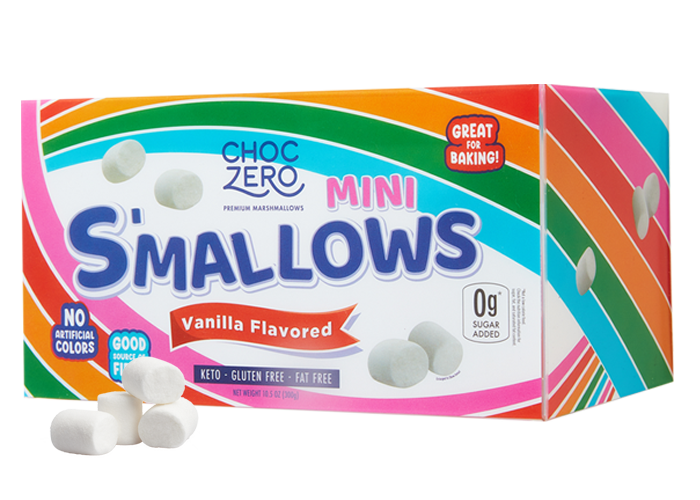 A colorful box of Choc Zero Mini S'mallows, labeled as vanilla flavored, features mini marshmallows and highlights that they are keto, gluten-free, and fat-free, with no artificial colors.