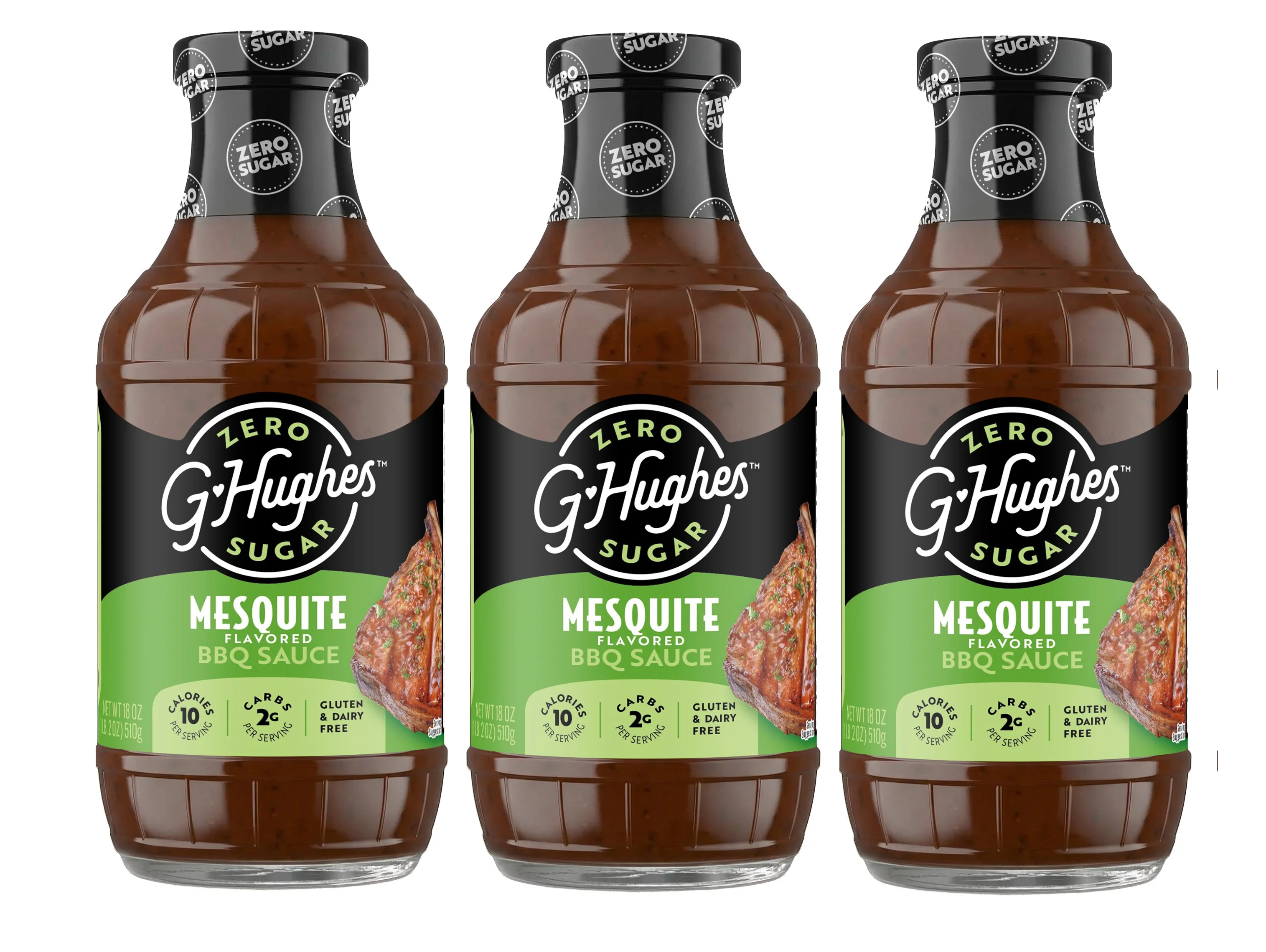 Three bottles of G. Hughes Zero Sugar Mesquite Flavored BBQ Sauce are displayed side by side, featuring a dark brown sauce with a label highlighting its low calorie and carb content, and gluten and dairy-free status.