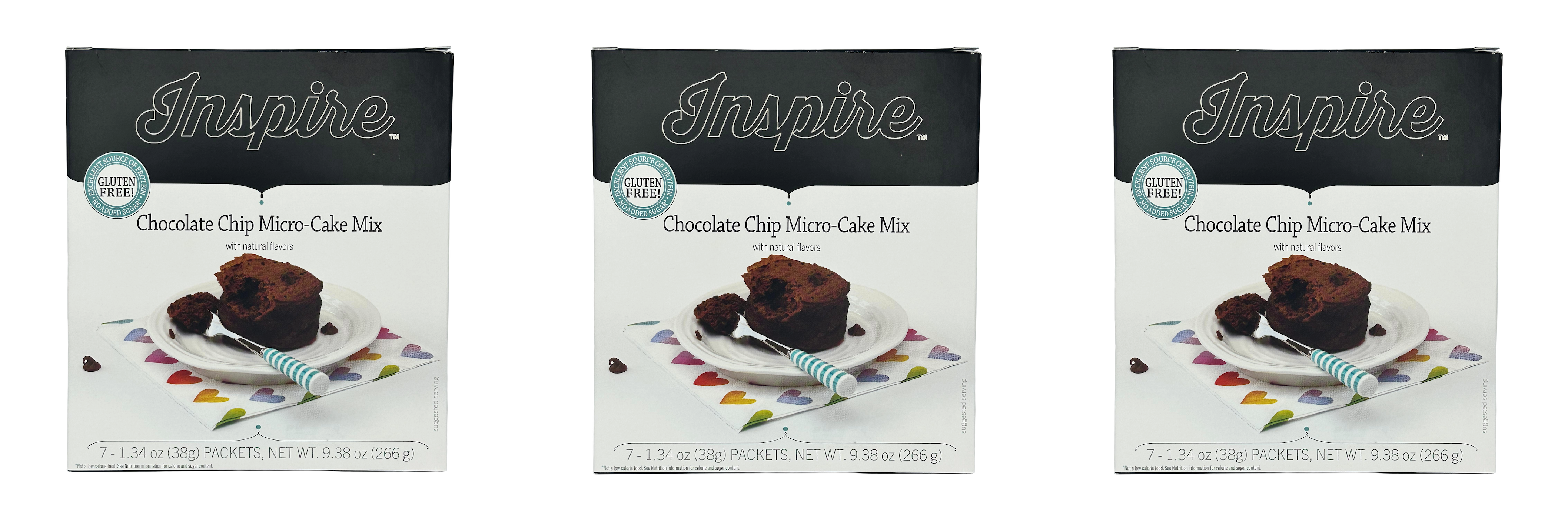 Three boxes of Inspire Chocolate Chip Micro-Cake Mix are displayed, each featuring a slice of cake on a plate with a fork, set against a colorful heart-patterned napkin.