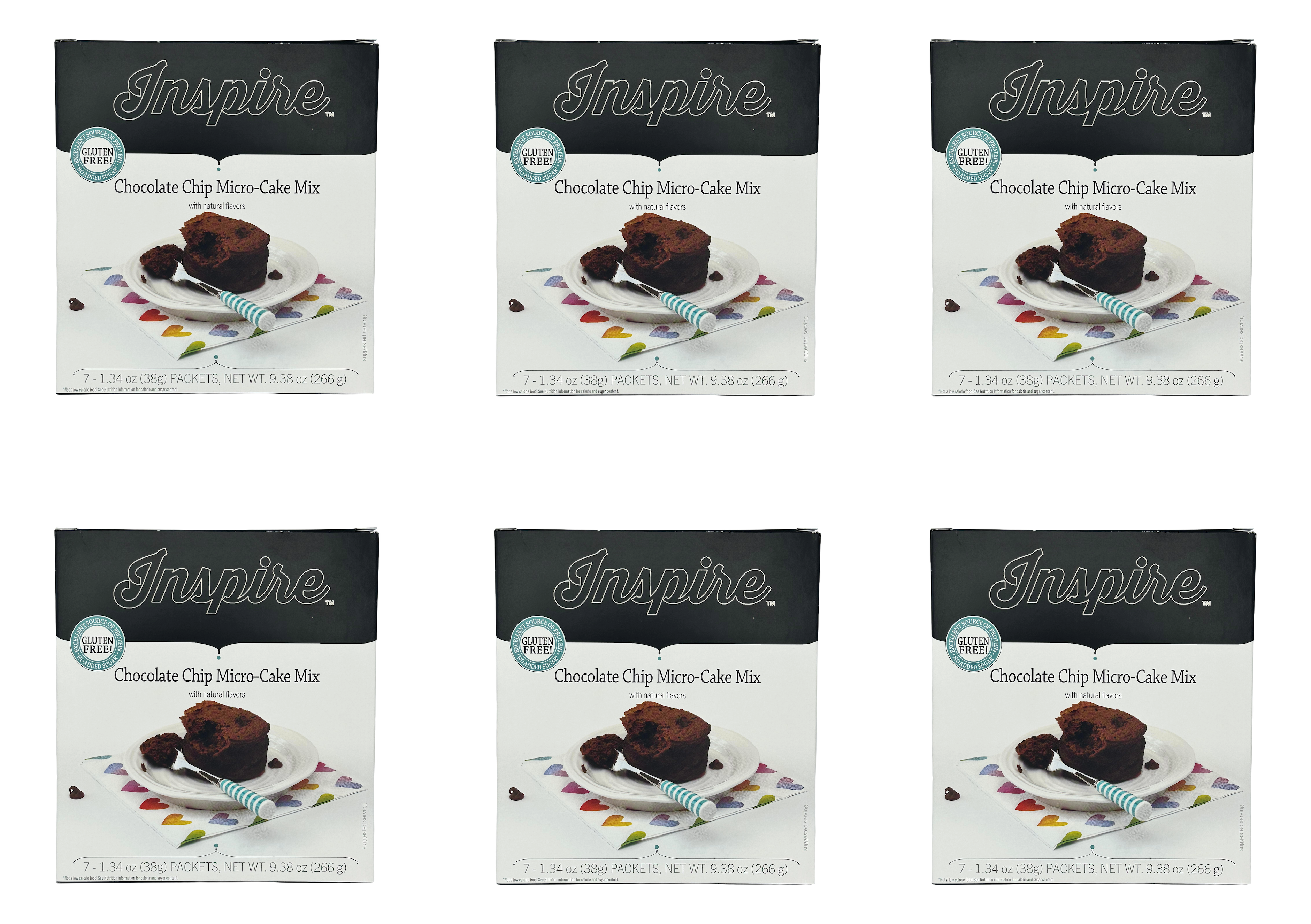 Six boxes of Inspire Chocolate Chip Micro-Cake Mix are displayed, each featuring a slice of cake on a plate with a fork, set against a colorful, heart-patterned napkin.