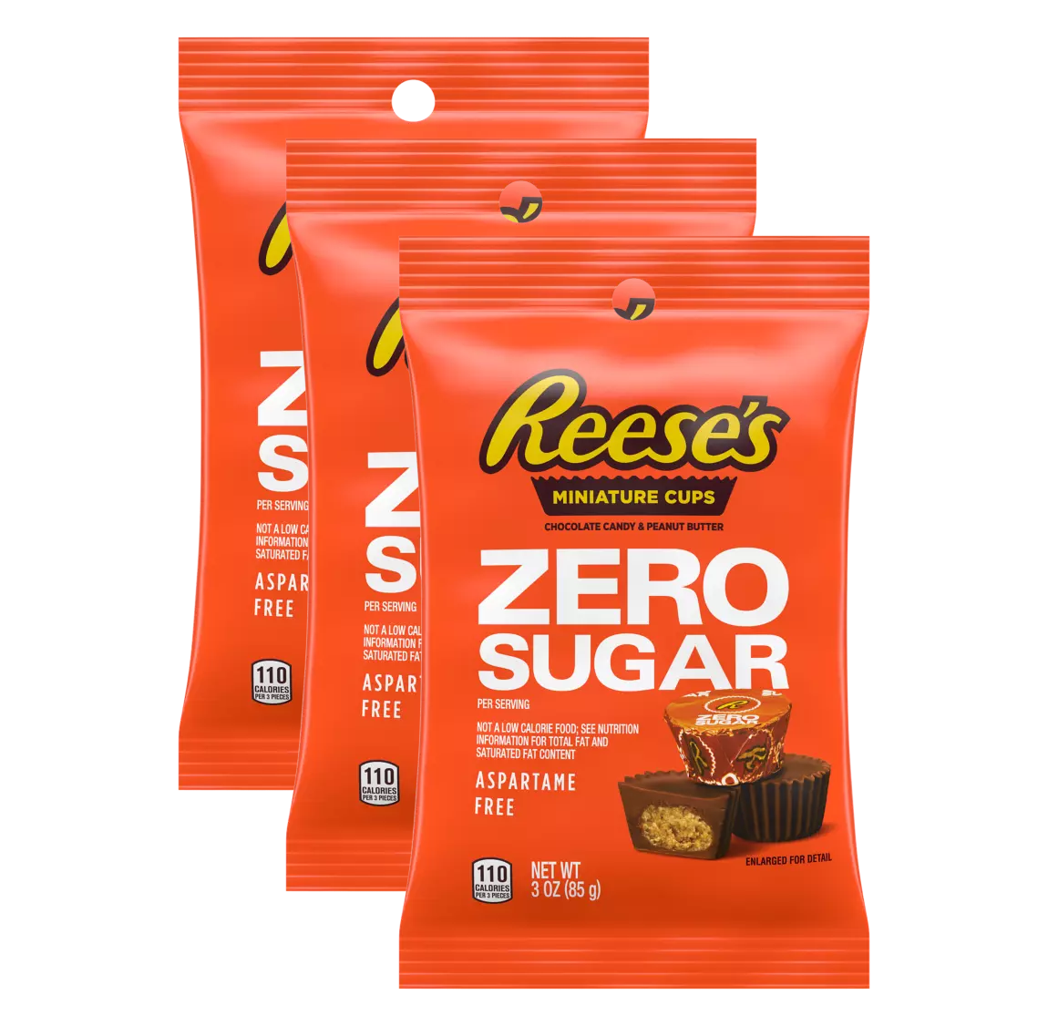 Three packages of Reese's Miniature Cups are displayed, featuring bold orange packaging with "ZERO SUGAR" prominently labeled, indicating a chocolate and peanut butter candy option that is aspartame-free.