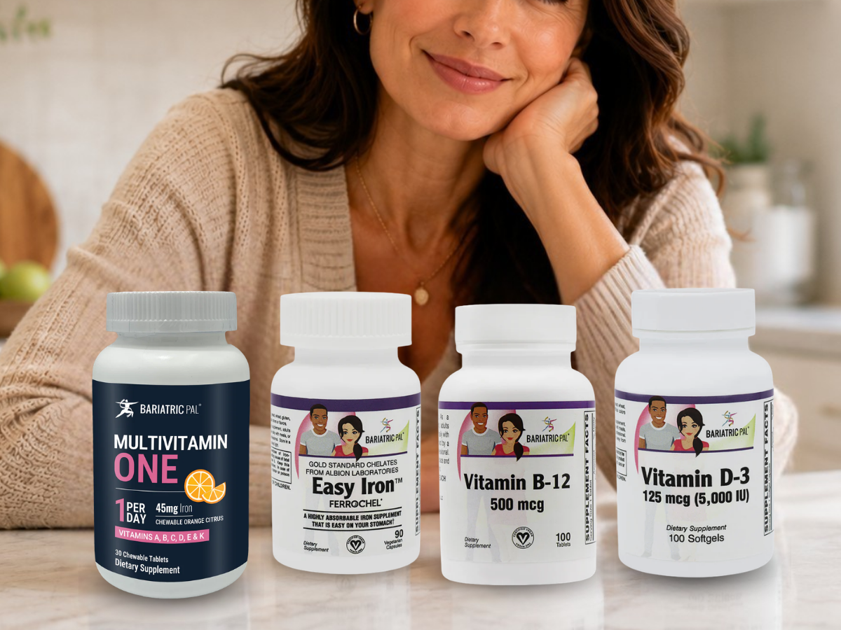 Confident woman in a bright kitchen with BariatricPal Multivitamin ONE, Easy Iron, Vitamin B-12, and Vitamin D-3 supplements arranged naturally on a white marble countertop.