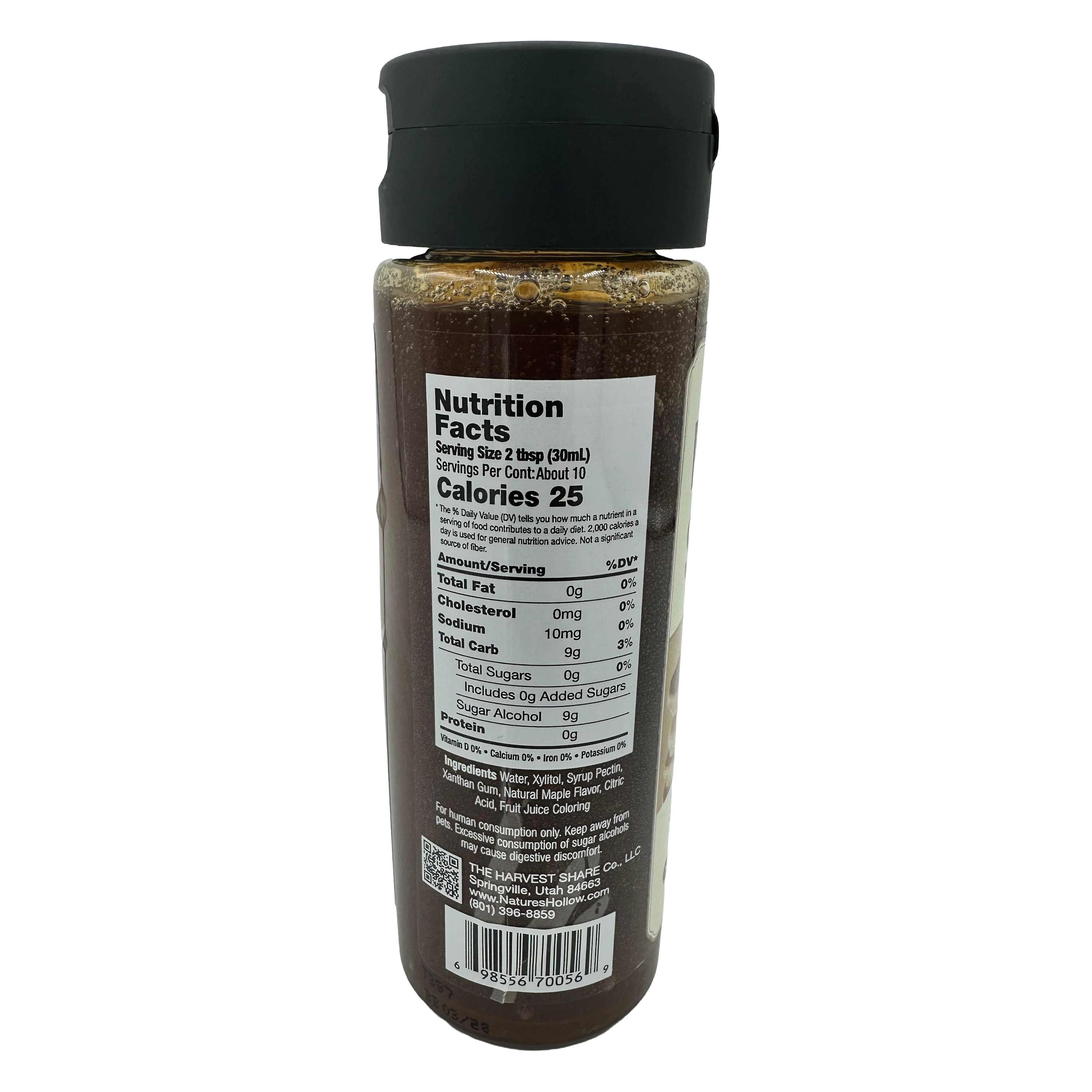 A clear bottle with a black cap displays nutrition facts, including serving size, calories, and ingredients, emphasizing its low-calorie content and sugar information for consumers.