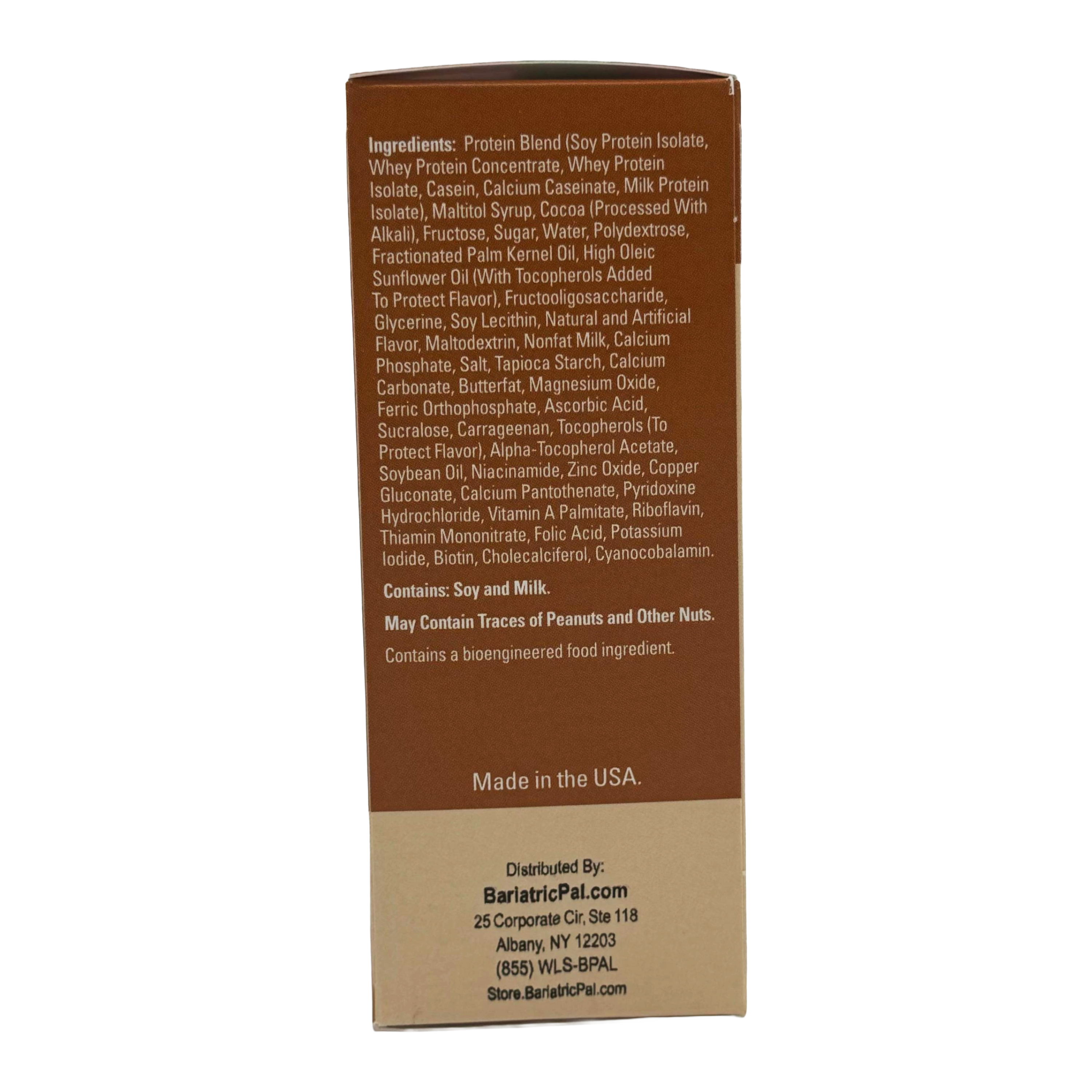 A brown product box displays a detailed list of ingredients, including various protein sources and additives, along with warnings about allergens and a note on bioengineered content.