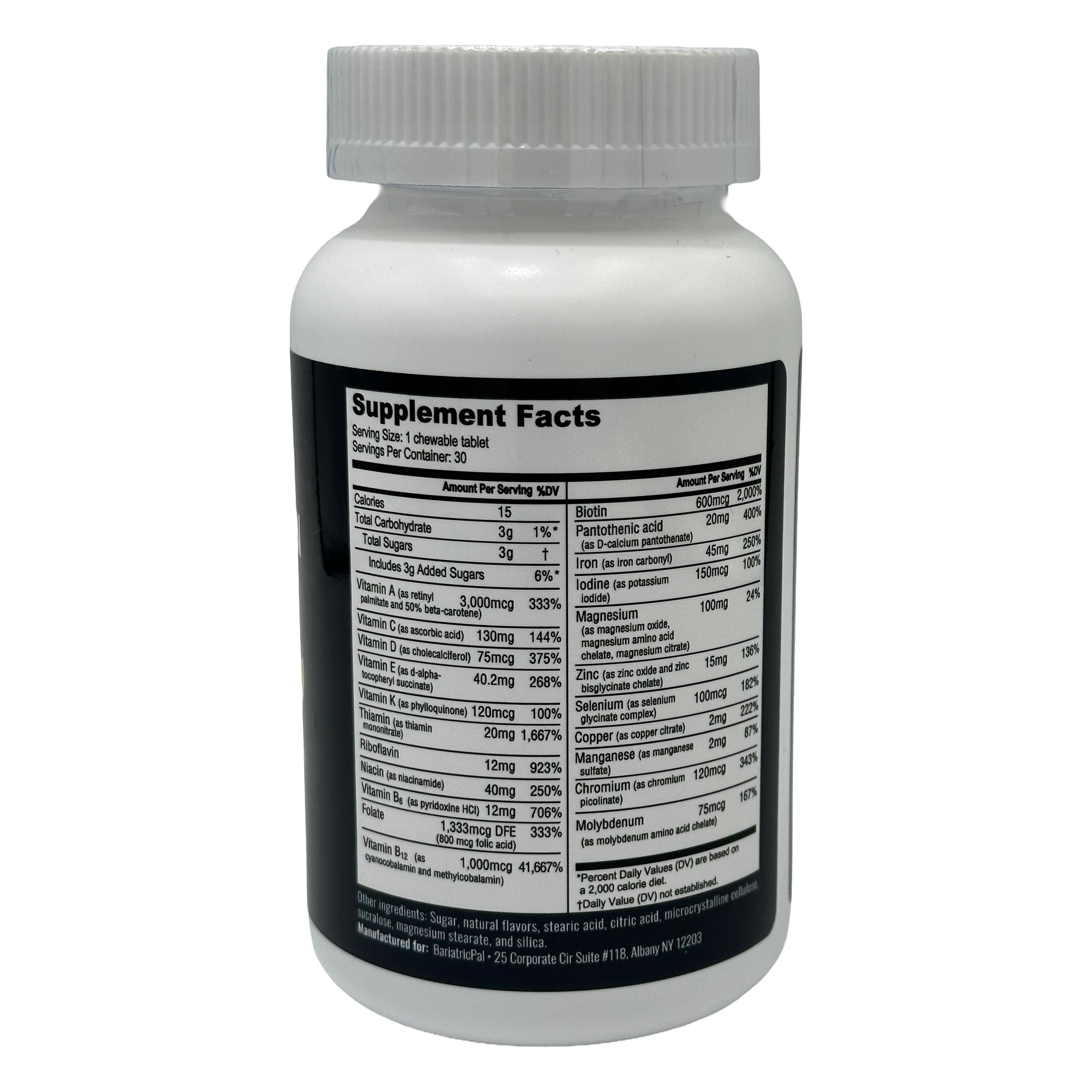 A white supplement bottle with a black label displays detailed nutritional information and serving facts, indicating it contains chewable tablets with various vitamins and minerals.
