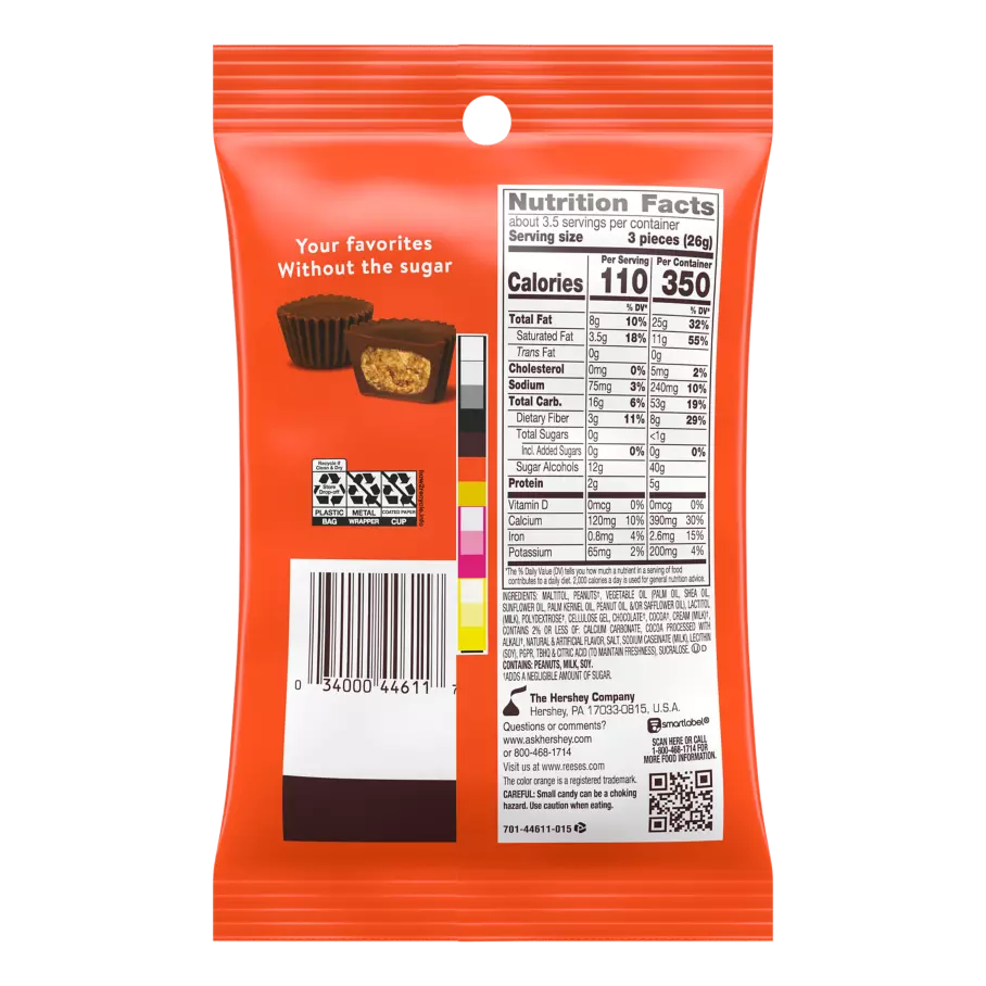 A bright orange snack bag displays a photo of chocolate cups on the left and detailed nutrition facts on the right, highlighting low calories and sugar-free content.