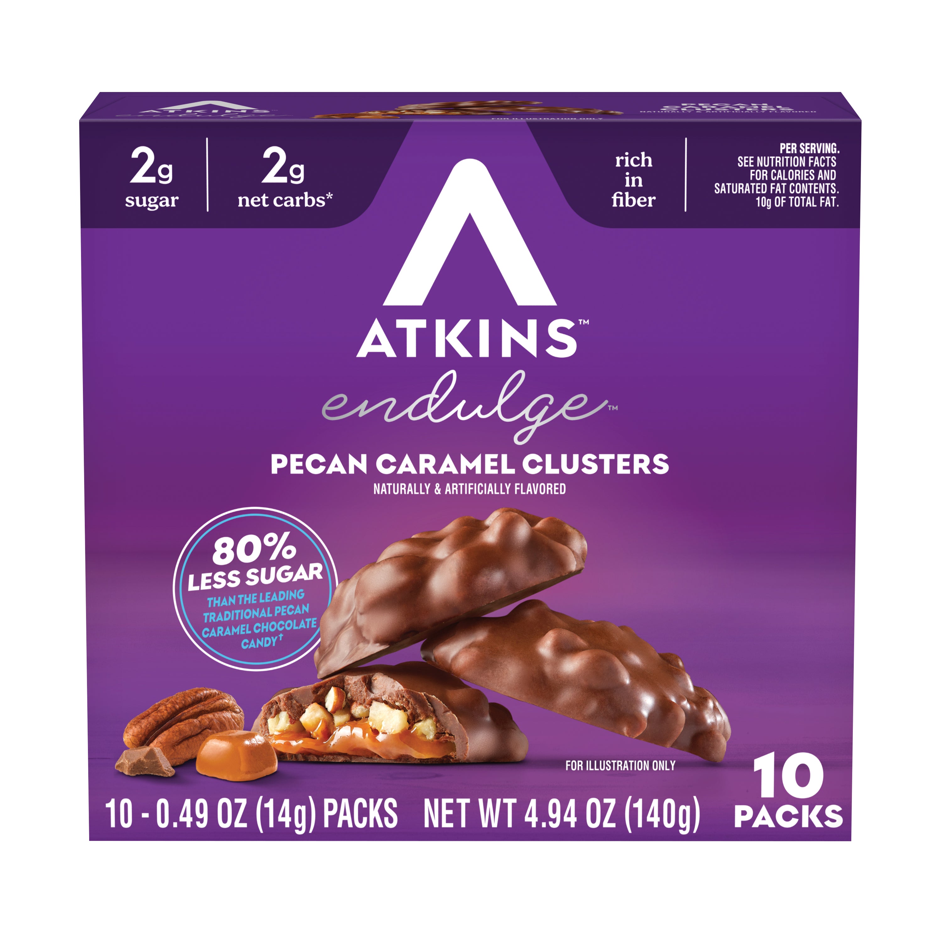 A purple box of Atkins Endulge Pecan Caramel Clusters, featuring 10 individual packs, displays the candy with a bite taken out, highlighting its low sugar content and fiber richness.