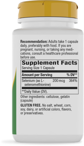 A white supplement bottle with a yellow cap displays the label featuring supplement facts, including selenium dosage and a gluten-free note, set against a plain background.