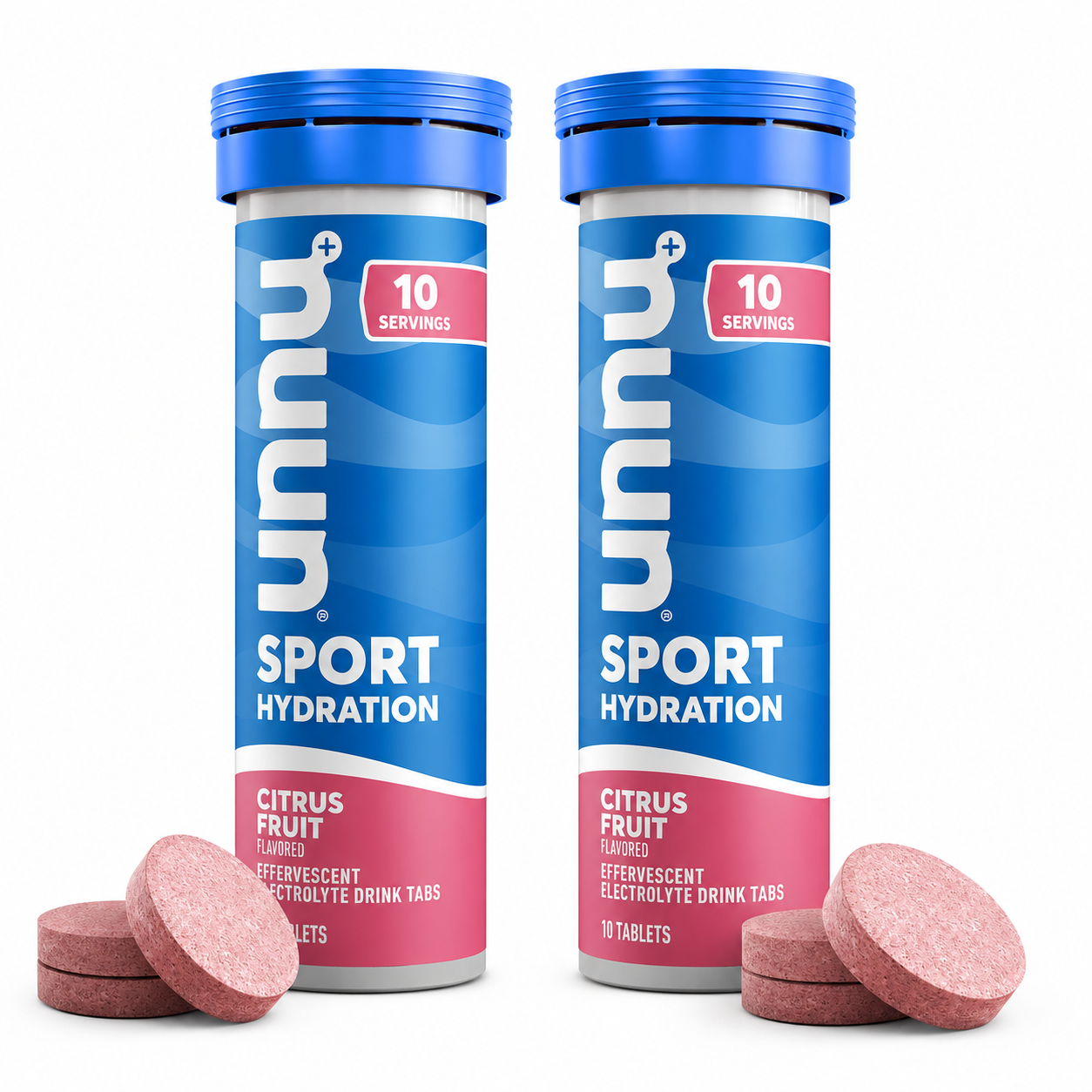 Two blue cylindrical containers of "nuun Sport Hydration" with pink labels and "Citrus Fruit" flavor sit beside three effervescent tablets on a white background.