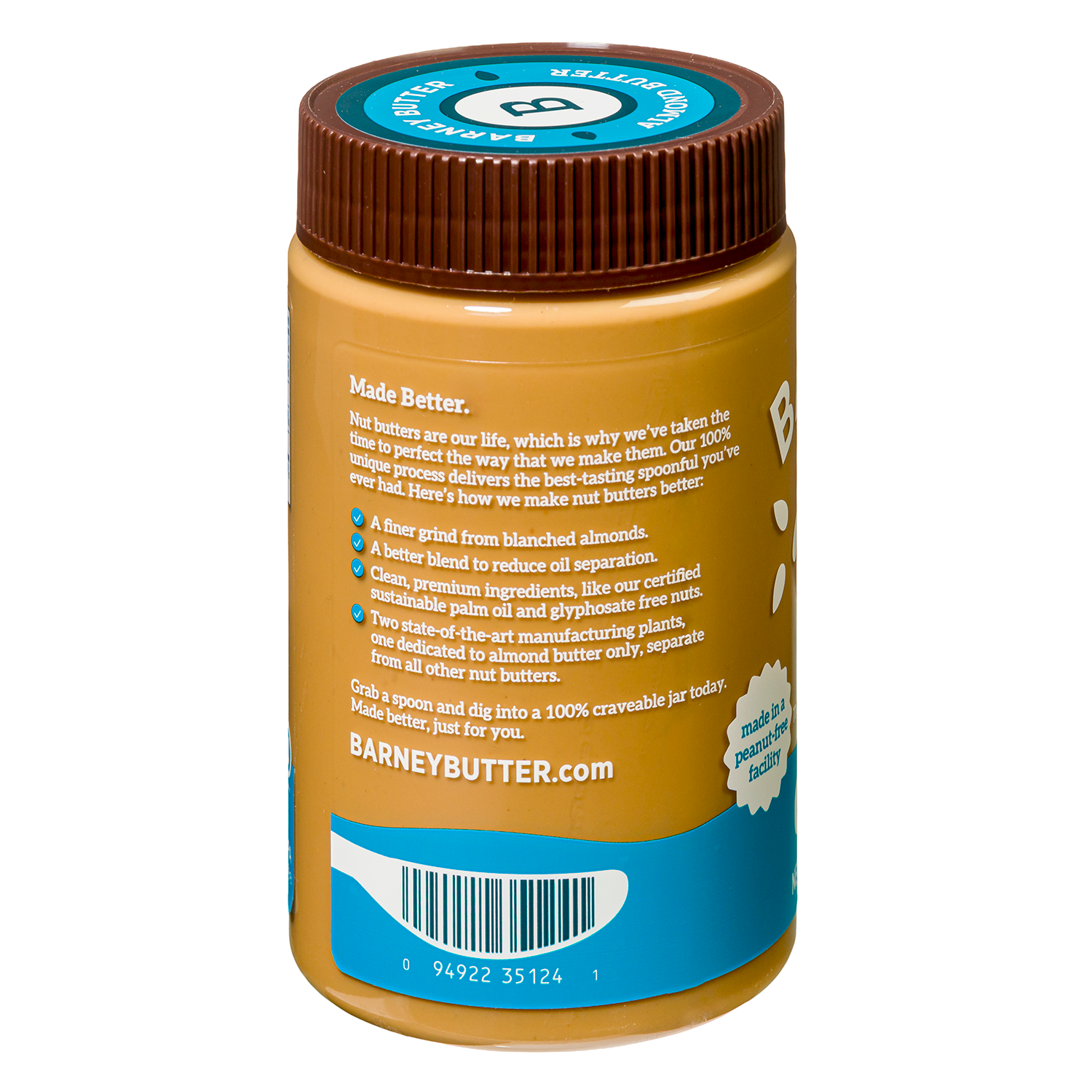 A brown jar of Barney Butter almond butter displays text highlighting its quality ingredients and manufacturing process, with a blue label and a barcode on the bottom.