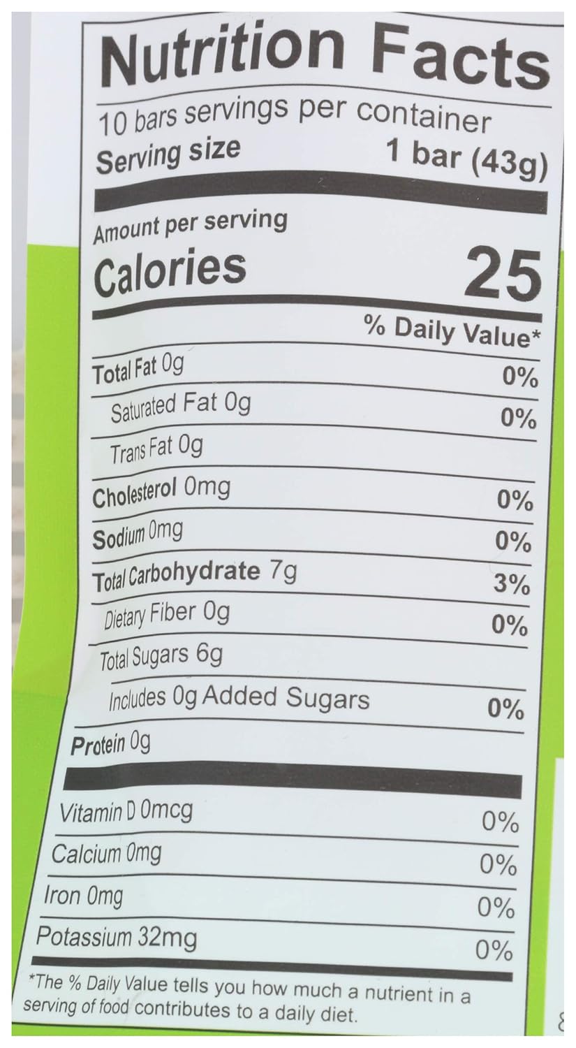 Nutrition facts label for a snack bar, detailing serving size, calories, and nutritional content such as fat, carbohydrates, sugars, and vitamins, with a green background.