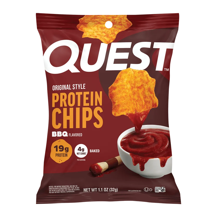 A red bag of Quest BBQ-flavored protein chips displays the product name prominently, with a bowl of dipping sauce beside it, highlighting its protein content and baked nature.