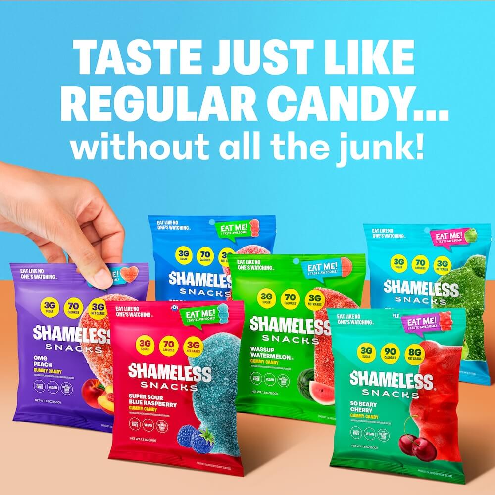 A hand reaches for a blue bag of Shameless Snacks, surrounded by colorful gummy candy packages labeled with flavors like "OMG Peach" and "So Berry Cherry," against a bright blue background.