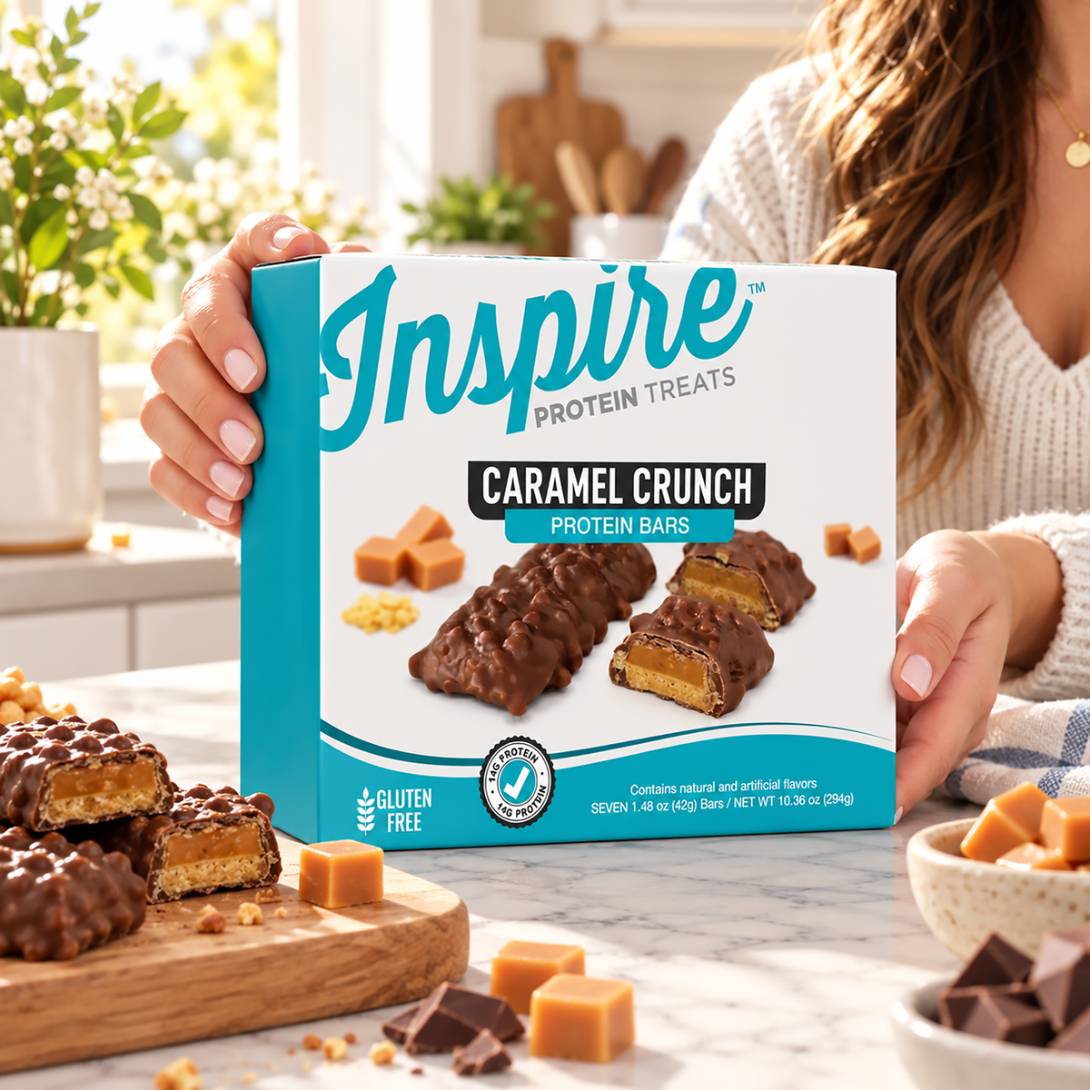 Inspire Protein Treats Caramel Crunch Protein Bars with 14 grams of protein per gluten-free bar. Contains seven chocolate-covered bars.