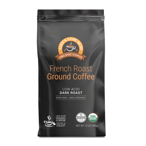 A black bag of Alex's Low Acid Organic Coffee features "French Roast Ground Coffee" in bold orange text, highlighting its low acid and dark roast qualities, with USDA Organic and kosher certifications.
