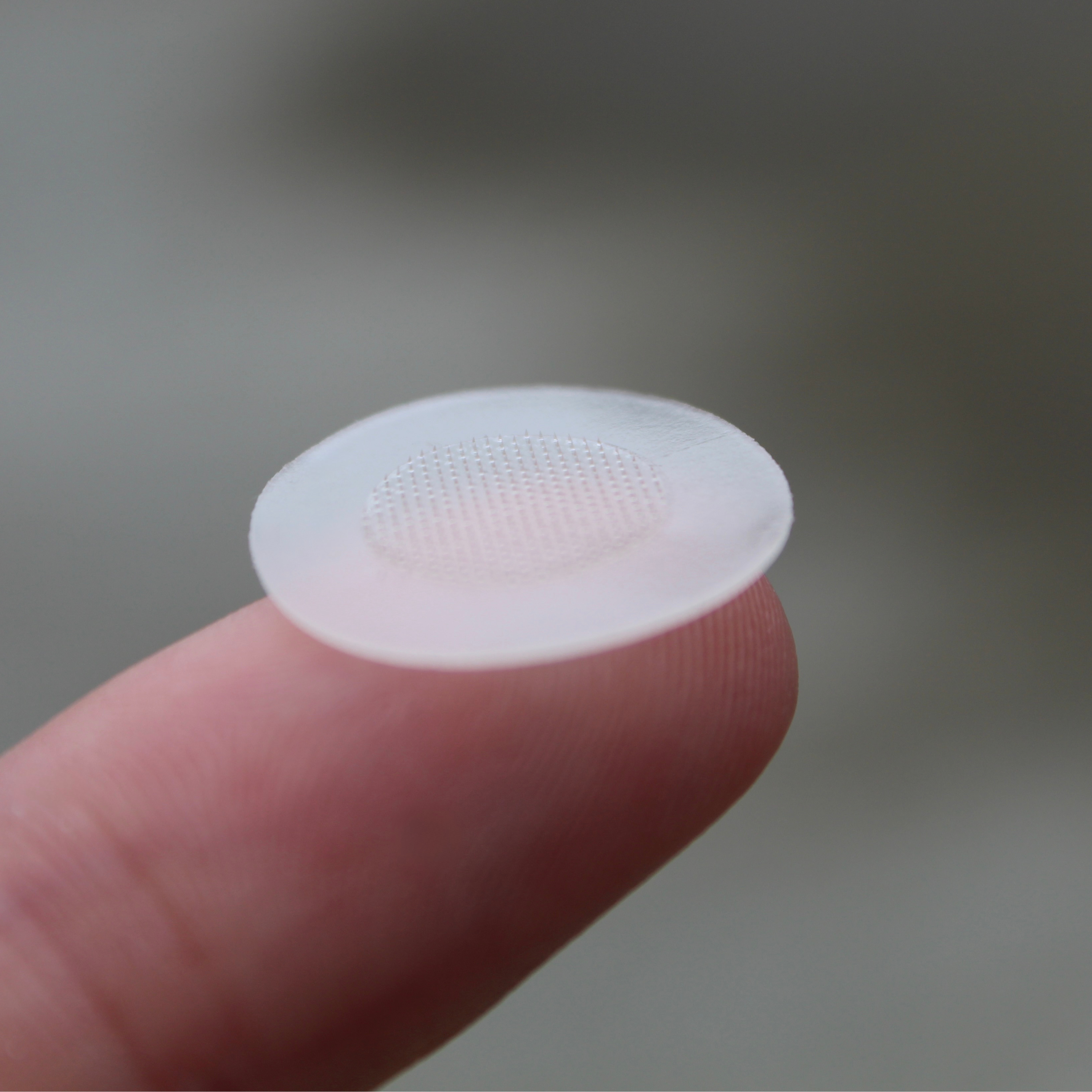 Finger holding microneedle pimple patch