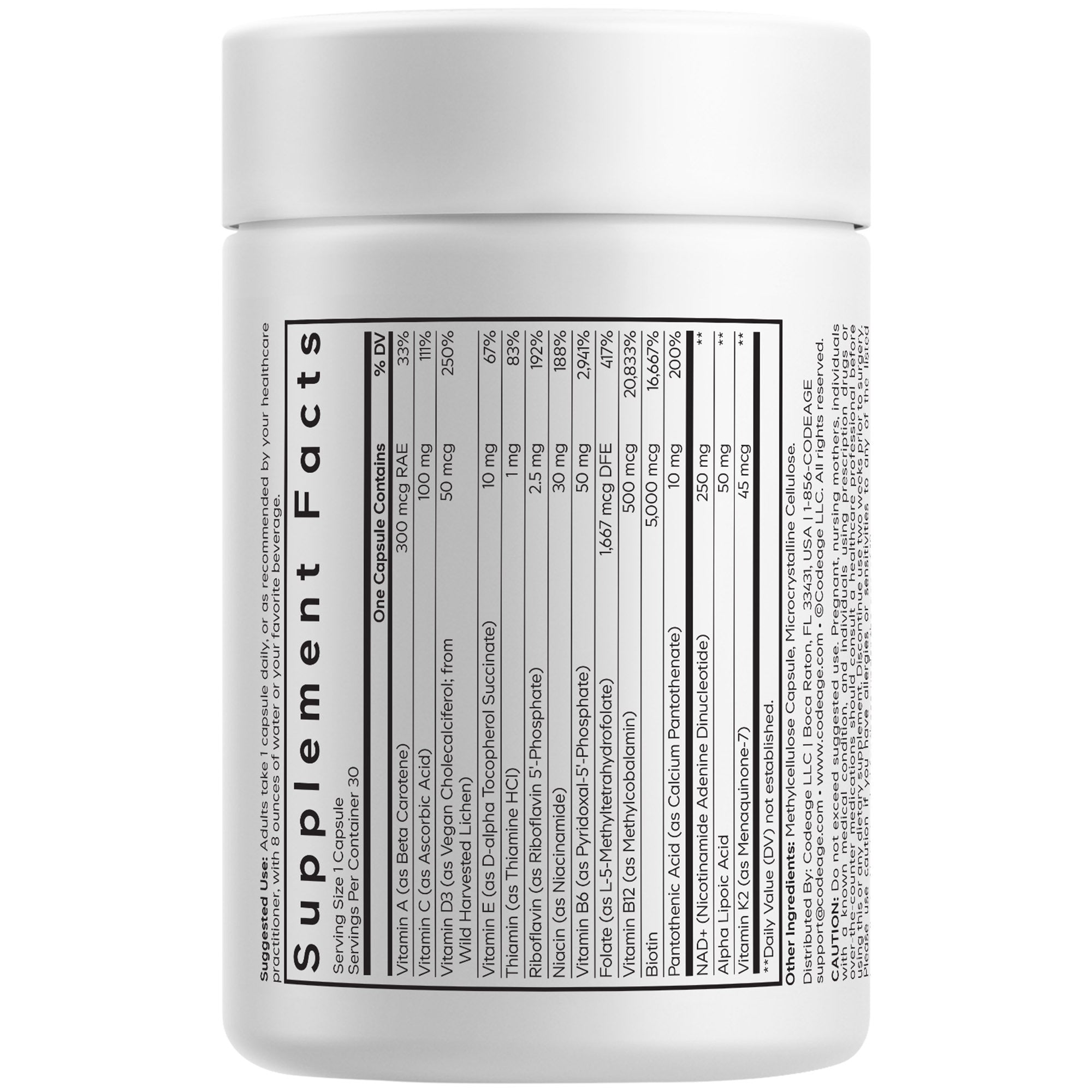 A white supplement bottle displays a detailed nutrition facts label, listing various vitamins and minerals with their respective amounts and percentages of daily value per capsule.