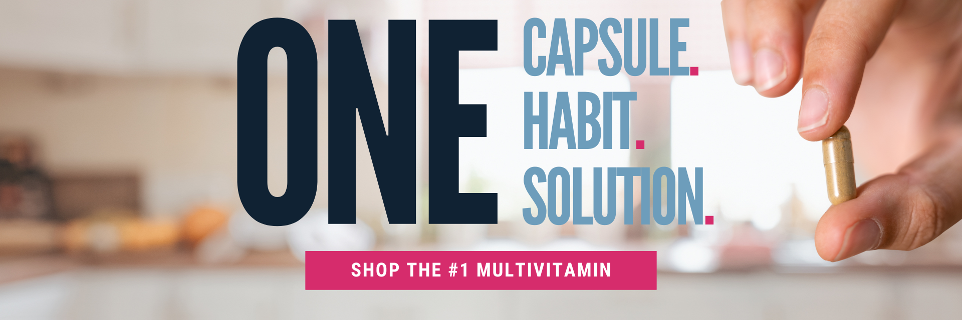 A hand holds a multivitamin capsule in a bright kitchen, with bold text promoting it as "One Capsule. Habit. Solution." and encouraging viewers to shop for the number one multivitamin.