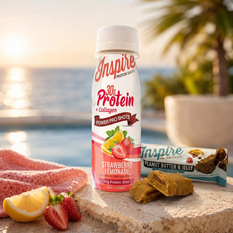 Protein shot bottle and snack bar with strawberry lemonade flavor on a beach setting
