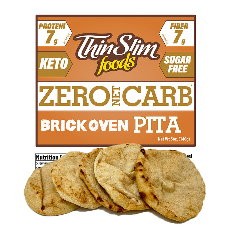 A package of Thin Slim Foods Zero Net Carb Brick Oven Pita, featuring five round, lightly toasted pitas in front of a colorful label highlighting its keto-friendly, sugar-free, and high-protein attributes.