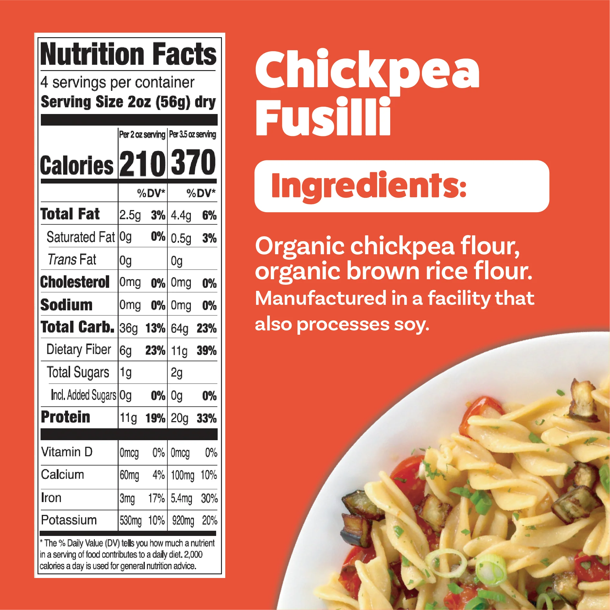 A colorful bowl of chickpea fusilli pasta is topped with diced vegetables, alongside a nutrition facts label detailing ingredients and nutritional information on a bright orange background.