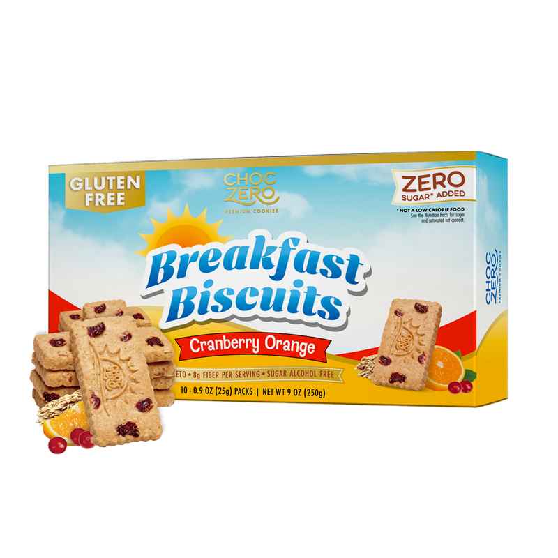 A box of ChocZero gluten-free breakfast biscuits in cranberry orange flavor, featuring biscuits stacked beside the box, with fruits and nutritional information displayed prominently.