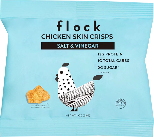 A light blue bag labeled "flock Chicken Skin Crisps Salt & Vinegar" features a cartoon chicken graphic and highlights nutritional information, including 13g protein and 0g sugar per serving.