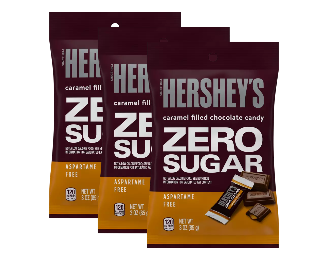 Three bags of Hershey's Zero Sugar caramel-filled chocolate candy are displayed, featuring bold text on the packaging indicating they are aspartame-free and weigh 3 ounces each.