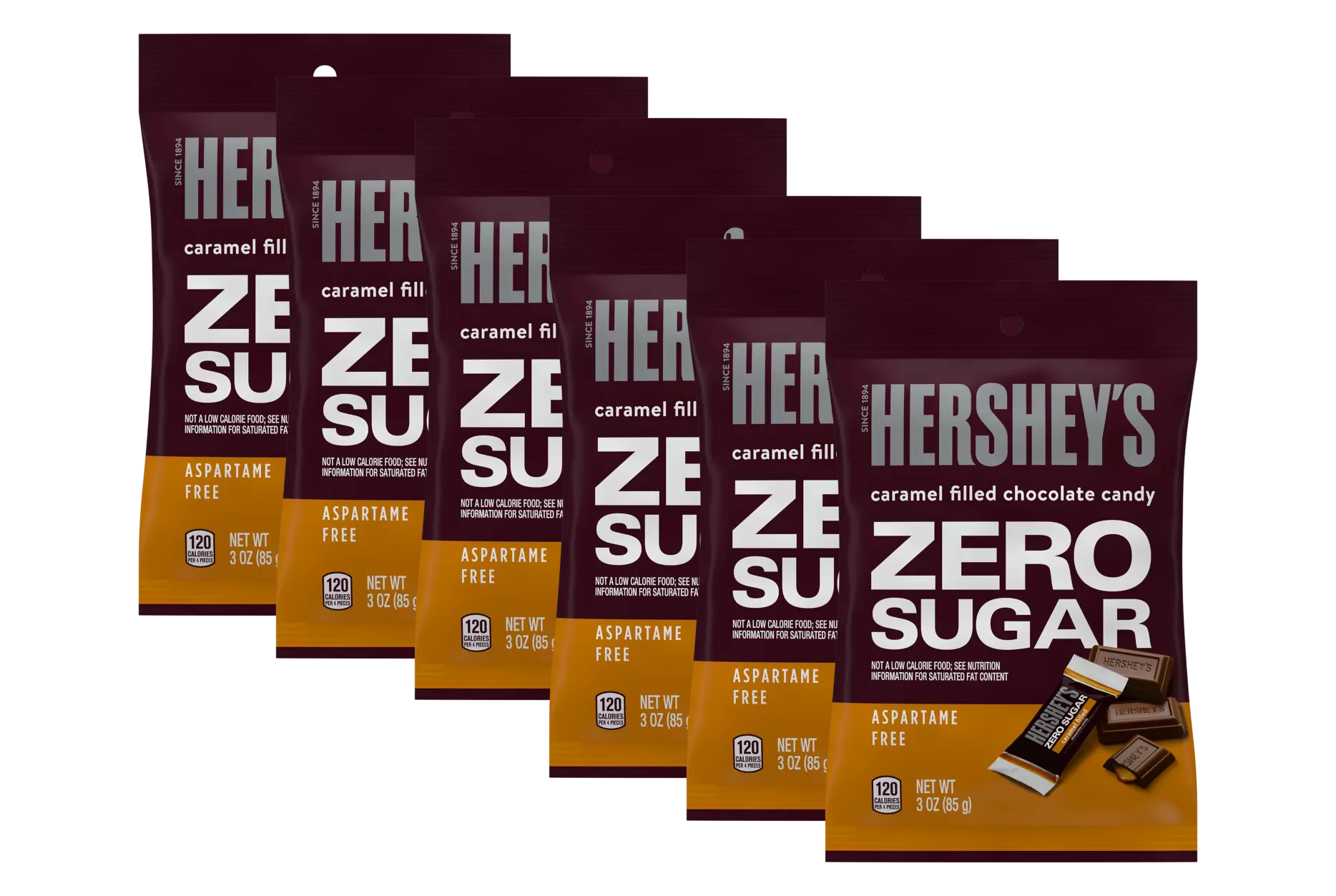 Six packages of Hershey's Zero Sugar caramel-filled chocolate candy are displayed, each labeled with "ZERO SUGAR" and "aspartame free," emphasizing their low-calorie content.