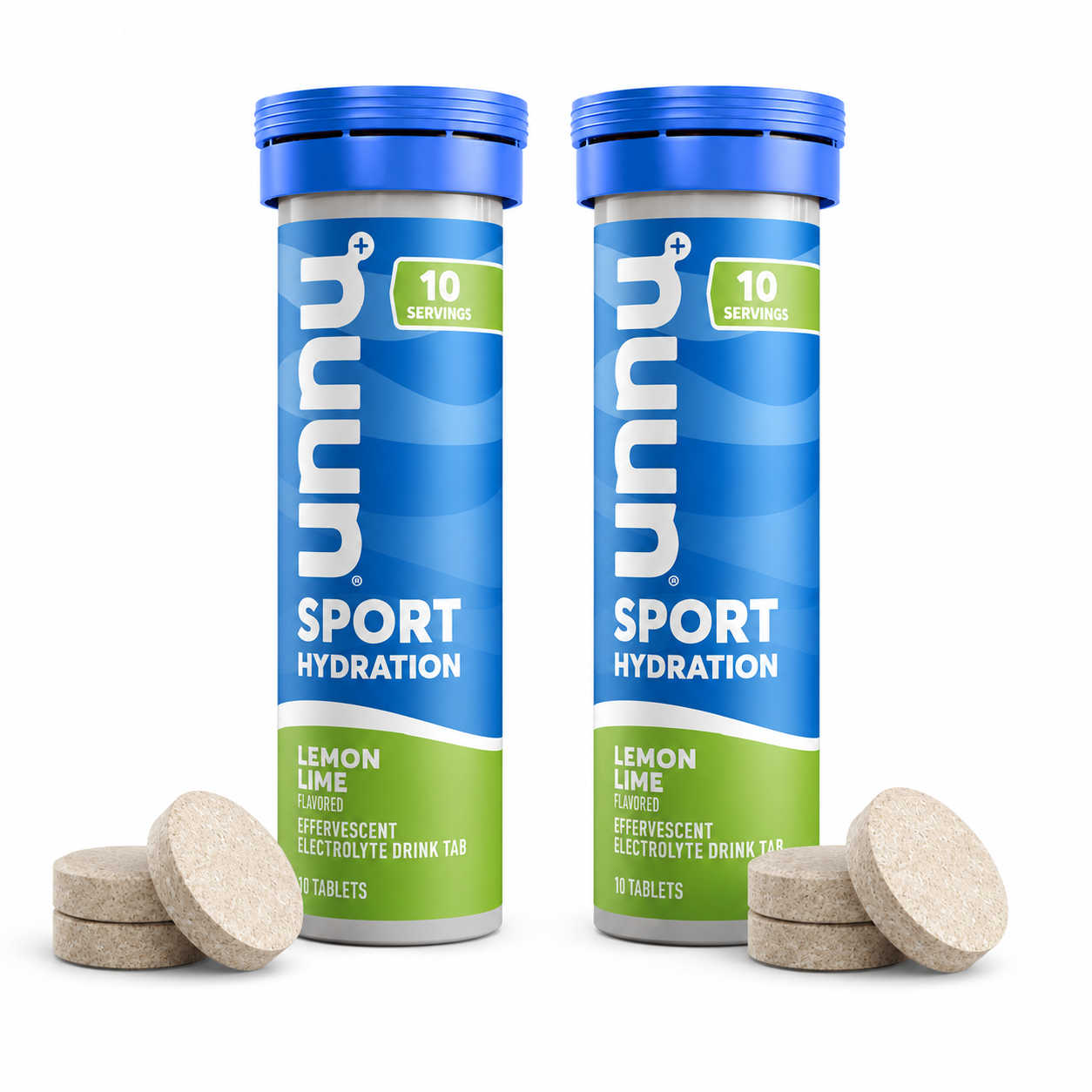 Two blue tubes of "Sport Hydration" electrolyte drink tablets labeled lemon-lime, with ten tablets each, sit beside three effervescent tablets on a white background.