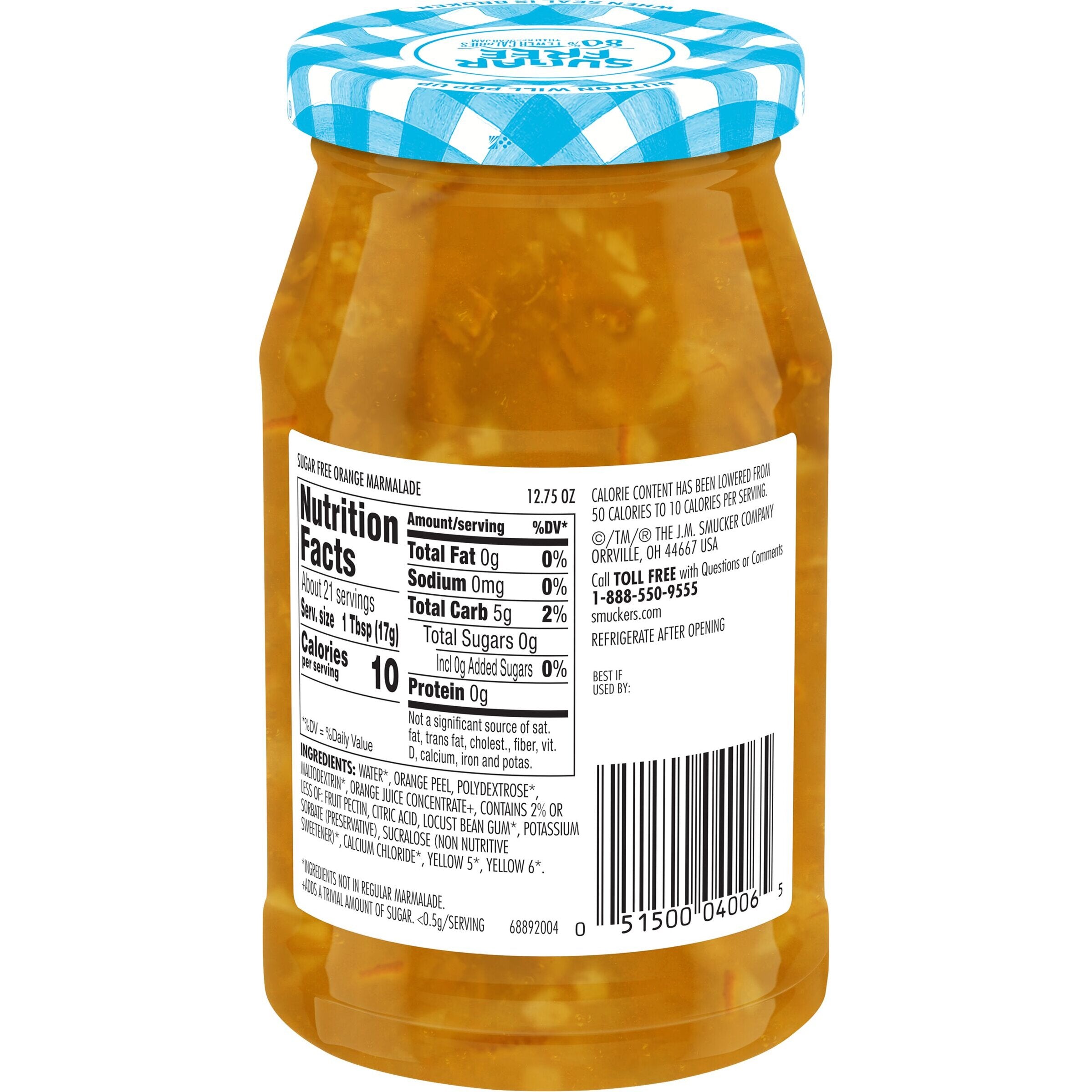 A jar of sugar-free orange marmalade with a blue and white checkered lid displays nutrition facts and ingredients on its label, indicating it contains no added sugars and is low in calories.