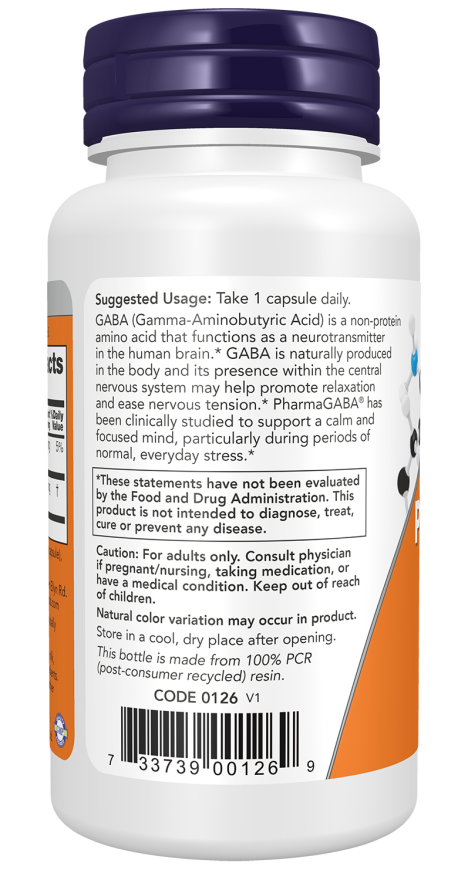 A white bottle with a dark blue cap contains dietary supplement capsules, featuring a label that outlines suggested usage, benefits of GABA, and important safety information.