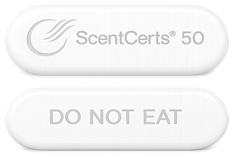 A white, oval-shaped object with the words "ScentCerts" and "DO NOT EAT" embossed on its surface.