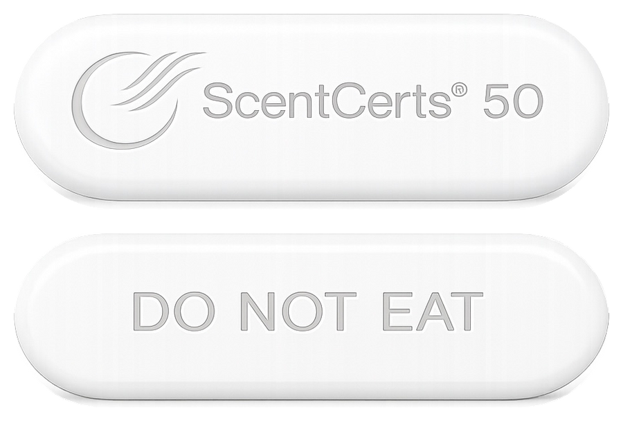 A white, oval-shaped object with the words "ScentCerts" and "DO NOT EAT" embossed on its surface.