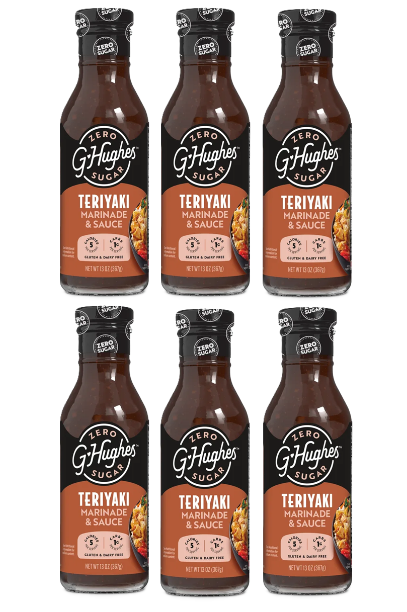 Six bottles of G. Hughes Zero Sugar Teriyaki Marinade and Sauce are arranged in two rows, showcasing their labels that highlight gluten-free and dairy-free features.